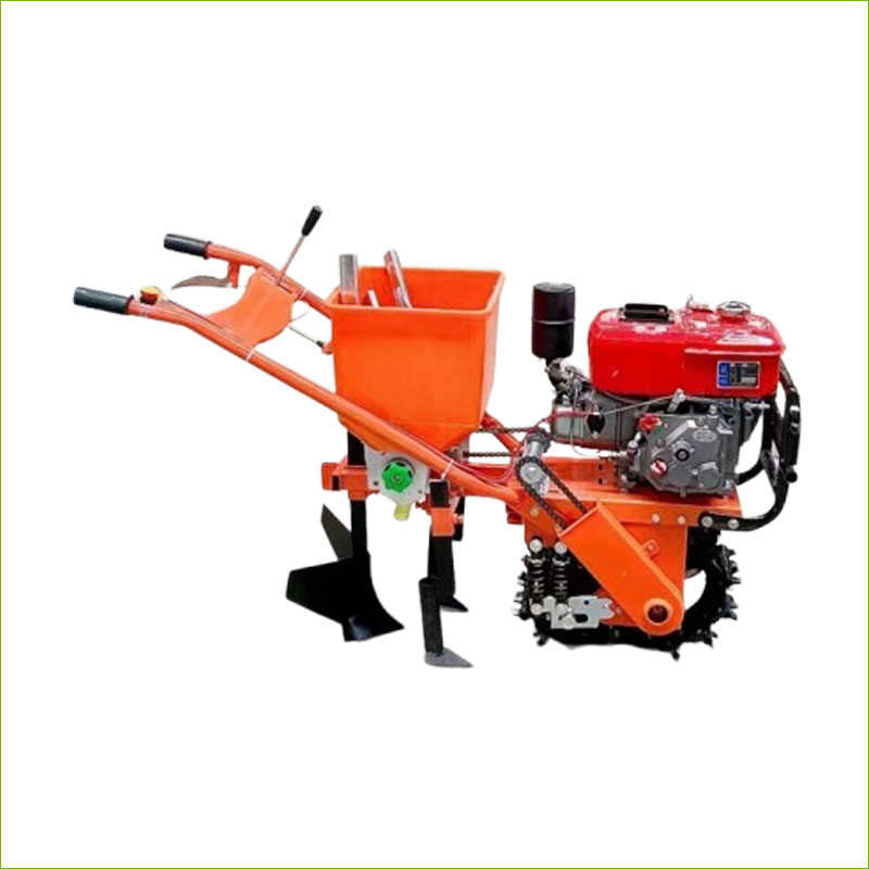 planteur de maïs à main